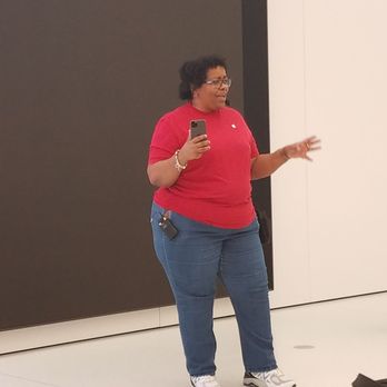 Apple Store - Apple Store employee demonstrating Apple's iPhone 11. - Mobile Phones Near Me - Columbia, Maryland