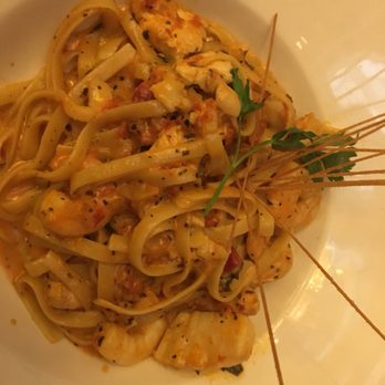 Spain Restaurant - Pasta special with shrimp, scallops, and chicken and red vodka sauce - Spanish Near Me - Cranston, Rhode Island Spain Restaurant - Pasta special with shrimp, scallops, and chicken and red vodka sauce - Spanish Near Me - Cranston, Rhode Island