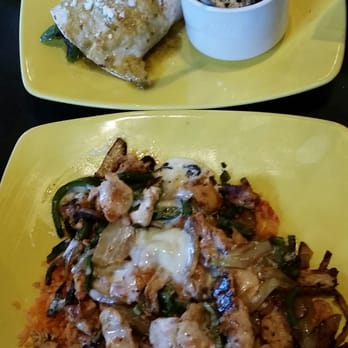 Mi Cancun - Arroz con Pollo (rice with chicken) pictured bottom and top is the Green Burrito - Mexican Near Me - Morrisville, North Carolina Mi Cancun - Arroz con Pollo (rice with chicken) pictured bottom and top is the Green Burrito - Mexican Near Me - Morrisville, North Carolina