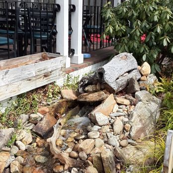 The Black Mountain Bistro - Babbling fountain next to some outside patio seating - Southern Near Me - Black Mountain, North Carolina The Black Mountain Bistro - Babbling fountain next to some outside patio seating - Southern Near Me - Black Mountain, North Carolina