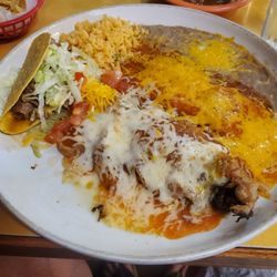 Beef taco, cheese enchilada, chili relleno, rice and beans