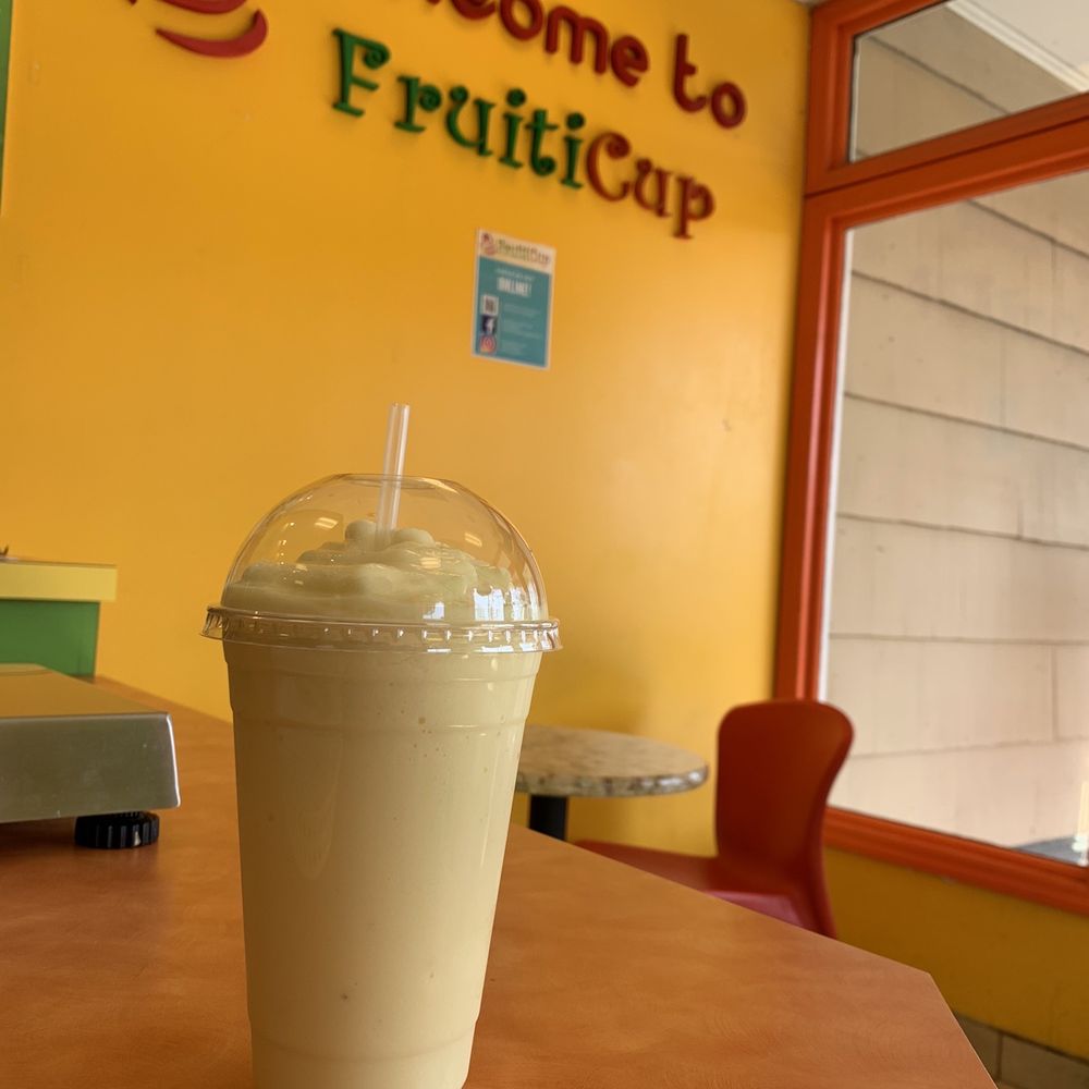 Fruiticup - a smoothie in a plastic cup on a table - Ice Cream & Frozen Yogurt Near Me - Charlotte, North Carolina Fruiticup - a smoothie in a plastic cup on a table - Ice Cream & Frozen Yogurt Near Me - Charlotte, North Carolina