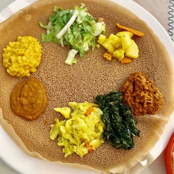 Tana Ethiopian Restaurant - Byainetu, the beef dishes came on the side - Ethiopian Near Me - Anaheim, California Tana Ethiopian Restaurant - Byainetu, the beef dishes came on the side - Ethiopian Near Me - Anaheim, California