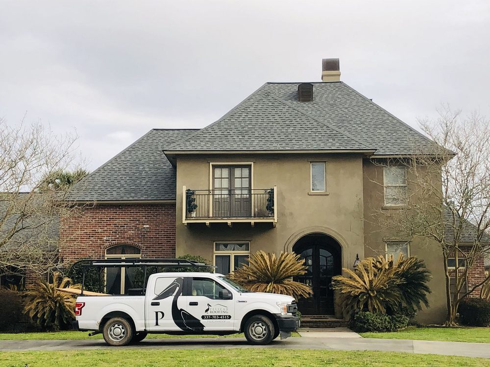 Slide of Pelican Roofing Company