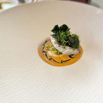 Ramón Freixa Madrid - Wild sea bass with champagne, watercress and collards - Signature Cuisine Near Me - Madrid, M