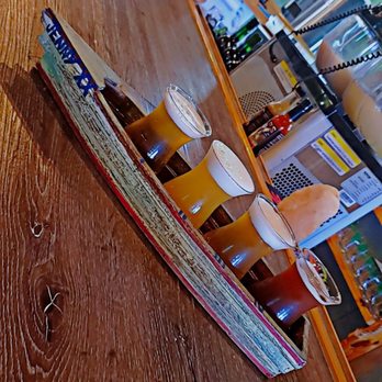 Coastal Karma Brewing - Beer flights served in canoes - Breweries Near Me - Lake Park, Florida Coastal Karma Brewing - Beer flights served in canoes - Breweries Near Me - Lake Park, Florida
