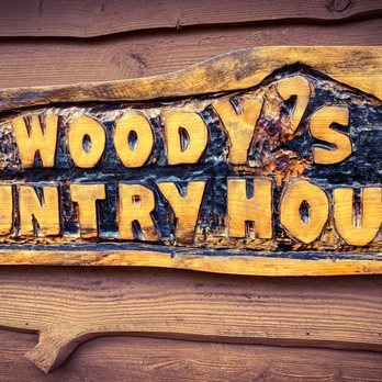 Woody's Country House - a wooden sign on the side of a building - American Near Me - Blakeslee, Pennsylvania Woody's Country House - a wooden sign on the side of a building - American Near Me - Blakeslee, Pennsylvania