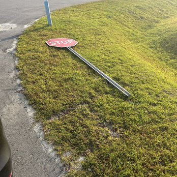 Sydes Construction - Fallen stop sign. Been like this for a month at least - General Contractors Near Me - Jacksonville, North Carolina