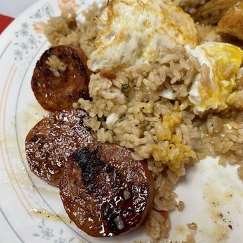 Harry's Café - Portuguese sausage and fried rice with two eggs $7.50 - Breakfast & Brunch Near Me - Honolulu, Hawaii Harry's Café - Portuguese sausage and fried rice with two eggs $7.50 - Breakfast & Brunch Near Me - Honolulu, Hawaii