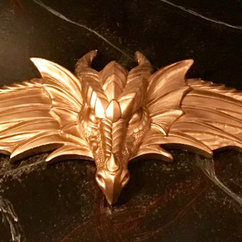 Mystique Dining - One of the dragons decorating the walls in the dining room. Guess how many are there? - Dinner Theater Near Me - Folsom, California