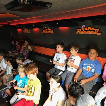 Game Runner - A very focused group of 6-8 year old's inside the GAME RUNNER! - Game Truck Rental Near Me Game Runner - A very focused group of 6-8 year old's inside the GAME RUNNER! - Game Truck Rental Near Me