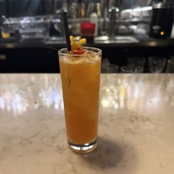 The Hidden Nene - The Iwakaluakumaha, a refreshing rum cocktail predominantly featuring carrot and passionfruit juice. - Cocktail Bars Near Me - Hilo, Hawaii
