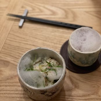 MĀZE - Kona abalone, dungeness crab, tsuyahime rice. Pairing vodka cocktail with strawberry and tomato notes was topped with the same citrus foam. - New American Near Me - Honolulu, Hawaii