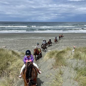 Crescent Trail Rides - Climbing the dunes - Horseback Riding Near Me Crescent Trail Rides - Climbing the dunes - Horseback Riding Near Me