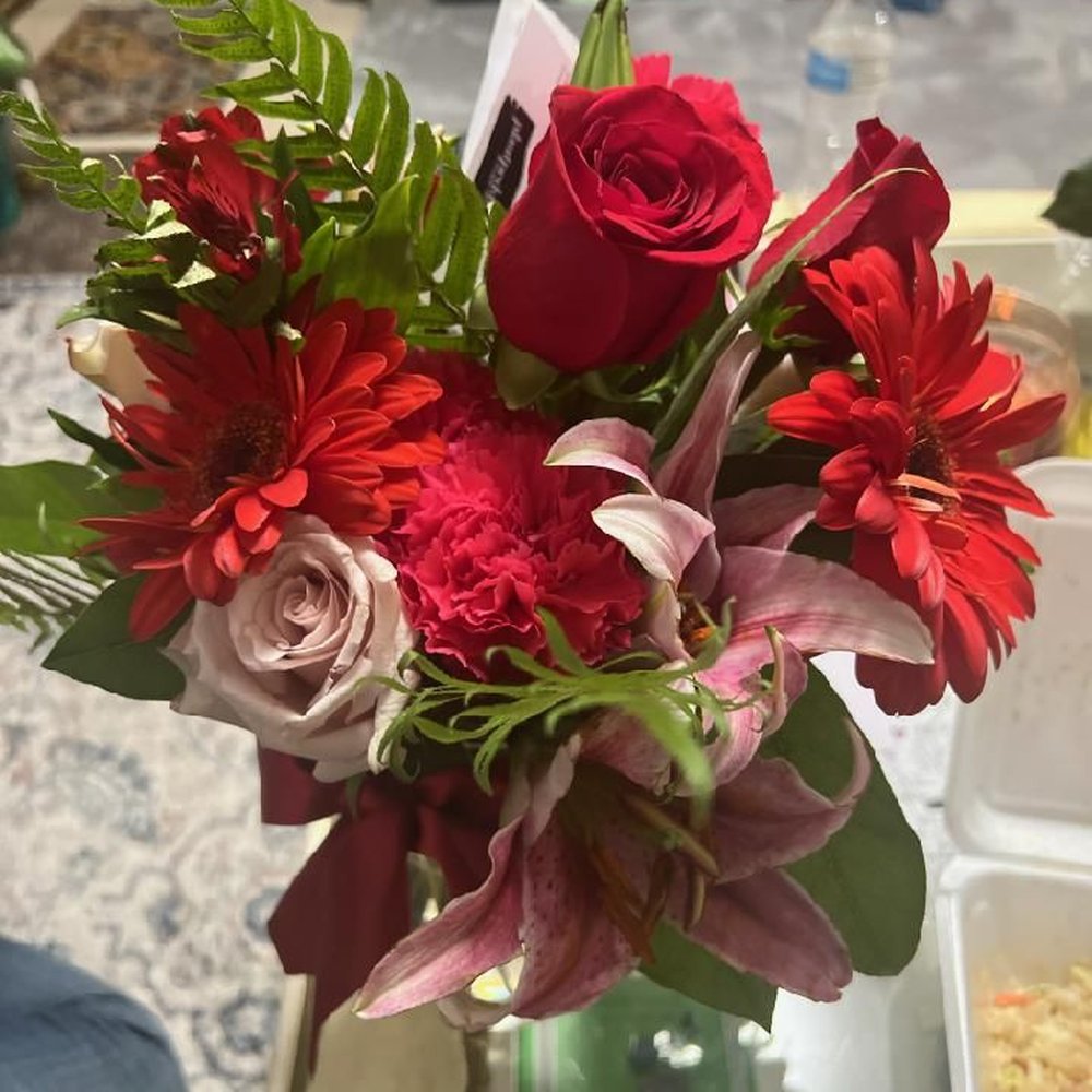 This is what my child received. BTW I hate carnations !! This is what my child received. BTW I hate carnations !!