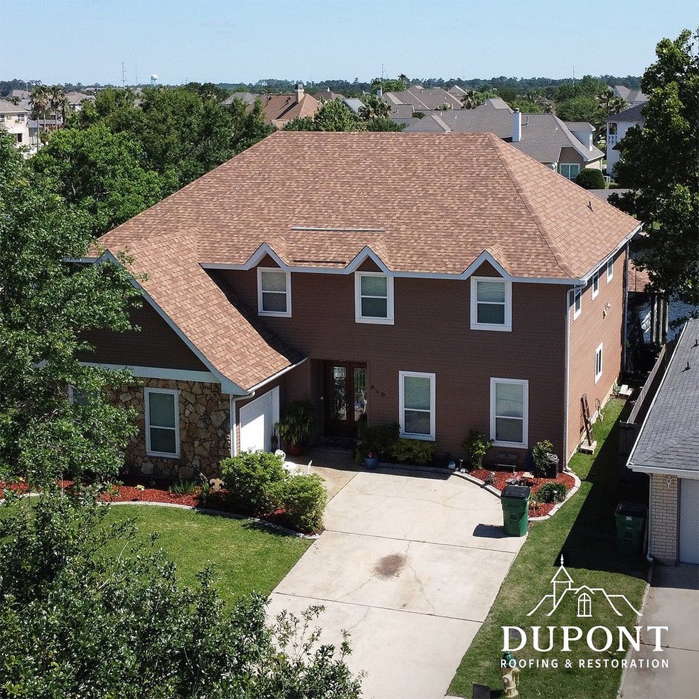 Slide of Dupont Roofing and Restoration