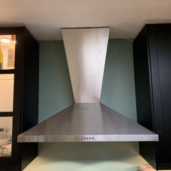 Pirkle Sheet Metal Fabricators - Offset venting required a custom vent hood to cover the ceiling hole and vent.