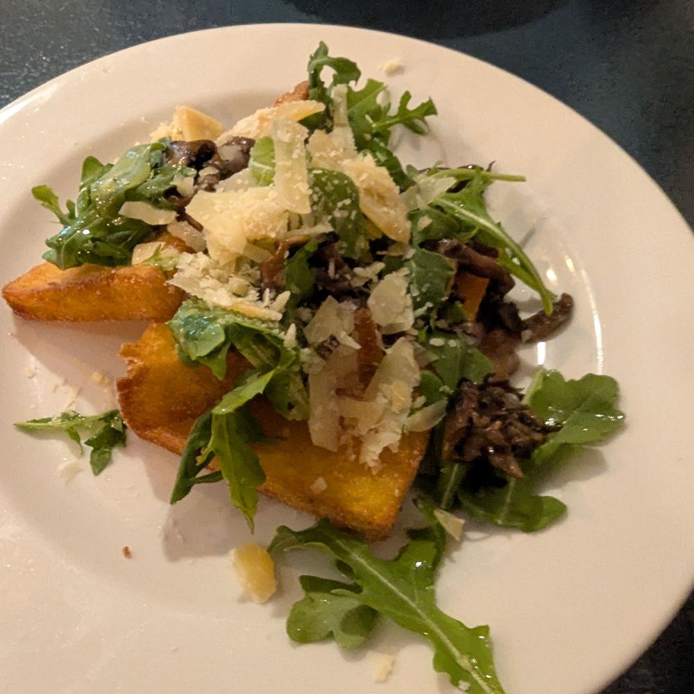 Crispy polenta with mushrooms and greens and a but of olive oil Crispy polenta with mushrooms and greens and a but of olive oil
