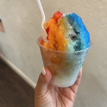 Sweet Spot Snoballs - a hand holding a cup of ice cream - Shaved Ice Near Me - Saint Cloud, Florida Sweet Spot Snoballs - a hand holding a cup of ice cream - Shaved Ice Near Me - Saint Cloud, Florida