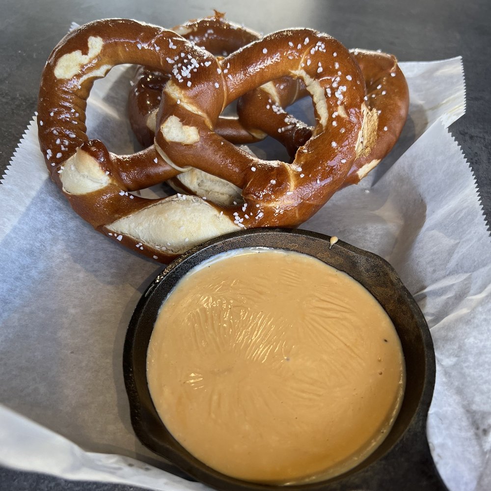 PopStroke - Pretzels with cheese fondue - Mini Golf Near Me - Orlando, Florida PopStroke - Pretzels with cheese fondue - Mini Golf Near Me - Orlando, Florida
