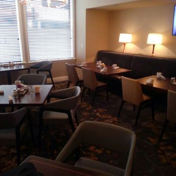High Street Grill - a dining area with tables and chairs - American Near Me - Columbus, Ohio High Street Grill - a dining area with tables and chairs - American Near Me - Columbus, Ohio
