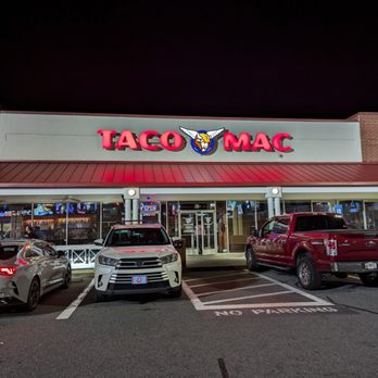 Taco Mac - Outside. Storefront at night. Located in the Lowe's shopping center on Dallas Highway in West Cobb. - American Near Me - Marietta, Georgia Taco Mac - Outside. Storefront at night. Located in the Lowe's shopping center on Dallas Highway in West Cobb. - American Near Me - Marietta, Georgia
