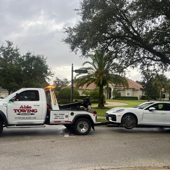 Able Towing & Roadside - Towing a Porsche Panarmera For 24/7 Towing, Roadside, and Exotic Transport call Able Towing 407-866-3464 - Towing Near Me Able Towing & Roadside - Towing a Porsche Panarmera For 24/7 Towing, Roadside, and Exotic Transport call Able Towing 407-866-3464 - Towing Near Me