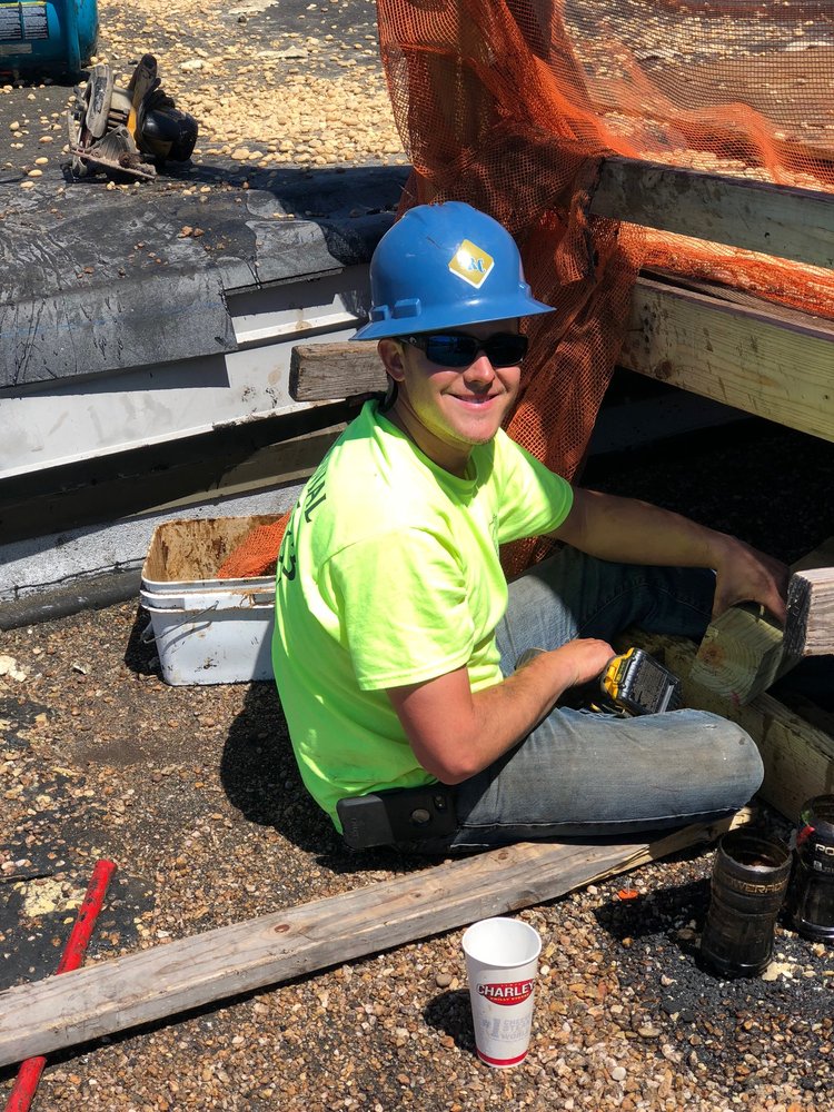 Slide of Centennial Roofing