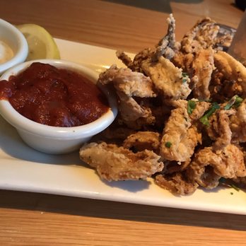 BJ's Restaurant & Brewhouse - Crispy Calamari.  Not that flavorful.  Lemon helped a lot. - New American Near Me - Pittsburgh, Pennsylvania