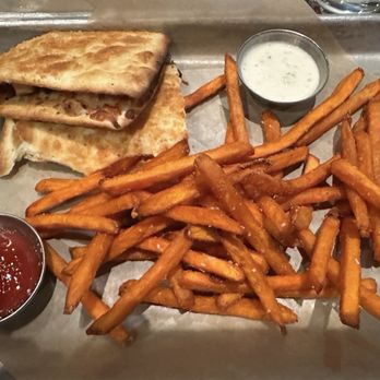 BJ's Restaurant & Brewhouse - Chicken Bacon Ranch Piadina w/Sweet Potato Fries - Breweries Near Me - Oklahoma City, Oklahoma BJ's Restaurant & Brewhouse - Chicken Bacon Ranch Piadina w/Sweet Potato Fries - Breweries Near Me - Oklahoma City, Oklahoma