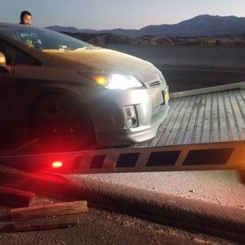 America's Tire - AAA roadside assistance helping with a tow on a flatbed that I had requested earlier over the phone with a AAA staff member. - Tires Near Me - Moreno Valley, California