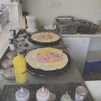 Frenchie’s Crepe Cafe - two pans with eggs on them - Creperies Near Me - Huntsville, Ontario