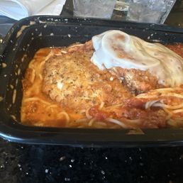 Cx parm with cheese on one half of the cx that had to be cut in half cuz first one was RAW!!!!!!!