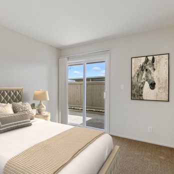 Sycamore Village - 2 bed down stairs looking out onto patio - Apartments Near Me - Tracy, California Sycamore Village - 2 bed down stairs looking out onto patio - Apartments Near Me - Tracy, California
