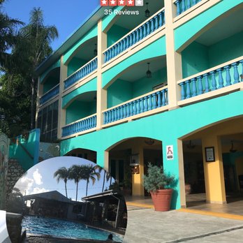 The Lazy Parrot Inn - Pool area and bar. - Hotels Near Me - Rincón, Puerto Rico The Lazy Parrot Inn - Pool area and bar. - Hotels Near Me - Rincón, Puerto Rico