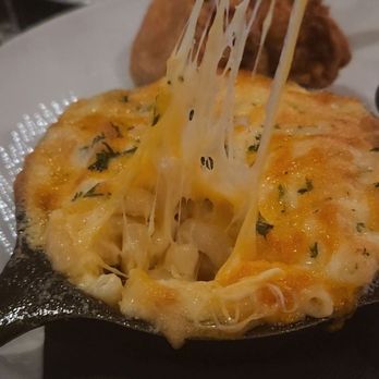 Clutch Restaurant - Cheese pull - Seafood Near Me - Atlanta, Georgia Clutch Restaurant - Cheese pull - Seafood Near Me - Atlanta, Georgia