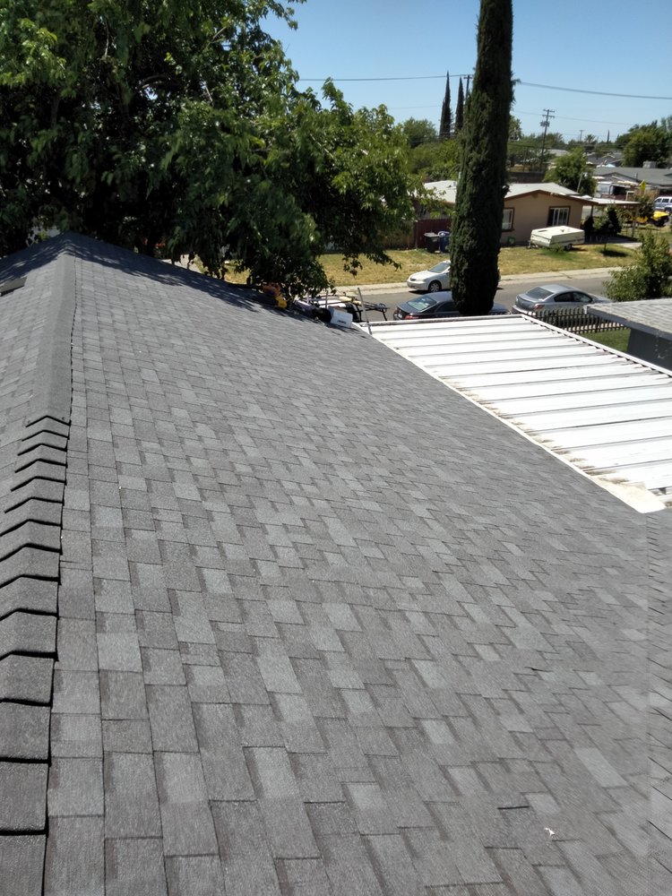 Slide of Precision Roofing