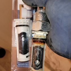 Plumberman - new and worn cartridges for a Moen shower valve side by side. Bristow VA,