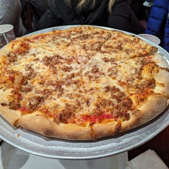 Delizia Pizza Kitchen - a pizza on a pan - Pizza Near Me - Flemington, New Jersey