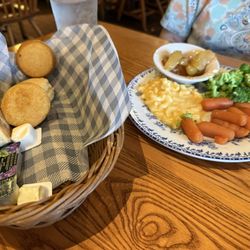 Cracker Barrel Old Country Store - Dry biscuits and off-tasting cornbread plus veggie plate.