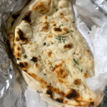 Indian Curries & Rolls - Garlic Naan - Indian Near Me - Sacramento, California Indian Curries & Rolls - Garlic Naan - Indian Near Me - Sacramento, California