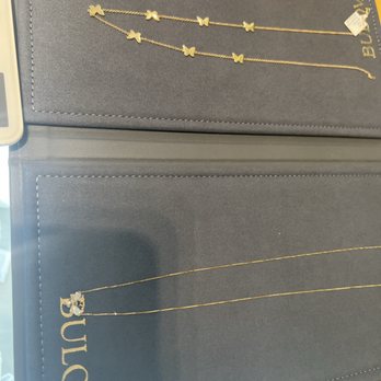 Valliani Jewelers - Gold butterfly necklace and bumble bee pendant - Jewelry Near Me - Northridge, California Valliani Jewelers - Gold butterfly necklace and bumble bee pendant - Jewelry Near Me - Northridge, California