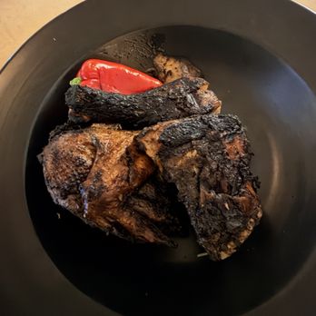 Spicy Mango - Whole Jerk Chicken (this is half order which is plenty) - Caribbean Near Me - New Orleans, Louisiana Spicy Mango - Whole Jerk Chicken (this is half order which is plenty) - Caribbean Near Me - New Orleans, Louisiana