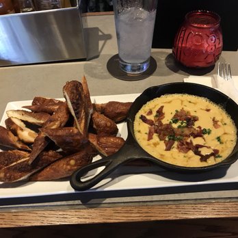 State & Main Kitchen & Bar - Pretzel bites with beer cheese for dipping - Bars Near Me - Etobicoke, Ontario State & Main Kitchen & Bar - Pretzel bites with beer cheese for dipping - Bars Near Me - Etobicoke, Ontario