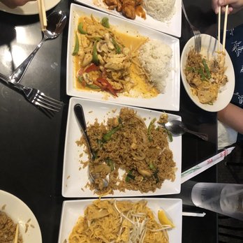 Thai Cafe - a variety of dishes of food with chopsticks - Thai Near Me - Howell, Michigan