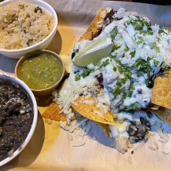 Taco Central Bar - Loaded Nachos with beans and rice - Sports Bars Near Me - Marion, Ohio Taco Central Bar - Loaded Nachos with beans and rice - Sports Bars Near Me - Marion, Ohio