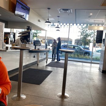 City Egg - a woman sitting at a table in a restaurant - Breakfast & Brunch Near Me - Toledo, Ohio