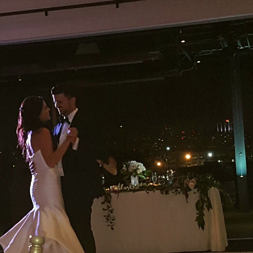 Adore Wedding Design - First dance - so you can see our Mr. and Mrs. Table with  the gorgeous skyline. Arranging seating for the room...also one of her skills!!! - Wedding Planning Near Me - Chula Vista, California