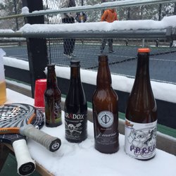 Arapahoe Tennis Club - Cooling beers in snow before next match!