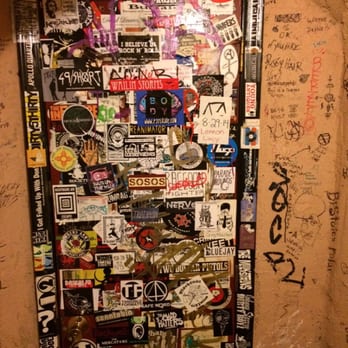 The Cave - a door covered in stickers - Bars Near Me - Chapel Hill, North Carolina The Cave - a door covered in stickers - Bars Near Me - Chapel Hill, North Carolina